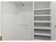 Spacious closet with multiple shelves for optimal storage and organization at 2323 S Jamaica St, Aurora, CO 80014