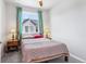 Guest bedroom with comfortable furniture and exterior window views at 19733 W 93Rd Ln # A, Arvada, CO 80007