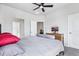 Comfortable bedroom with views to the en-suite bathroom at 19733 W 93Rd Ln # A, Arvada, CO 80007