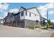 New townhomes with stone accents and attached garages offer modern living at 19733 W 93Rd Ln # A, Arvada, CO 80007