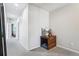 Hallway with neutral carpet and interior view to the bedroom at 19733 W 93Rd Ln # A, Arvada, CO 80007
