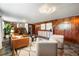 Comfortable living room with a cozy couch, stylish chairs, and a modern rug at 5503 W Colorado Ave, Lakewood, CO 80232