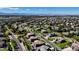 Panoramic aerial view of a residential neighborhood featuring well-maintained homes, lush greenery, and manicured lawns at 1440 Eversole Dr, Broomfield, CO 80023