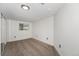 Cozy bedroom with neutral carpeting, a window for natural light, and a closet at 7892 Beverly Blvd, Castle Pines, CO 80108