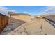 Long concrete driveway leading up to the home's detached garage at 7892 Beverly Blvd, Castle Pines, CO 80108