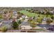 Aerial view of neighborhood, golf course, and residences at 1261 E 135Th Pl, Thornton, CO 80241