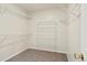 Spacious walk-in closet with multiple wire shelves at 1261 E 135Th Pl, Thornton, CO 80241