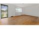 Spacious living room with hardwood floors and bright natural light at 8012 Zuni St, Denver, CO 80221