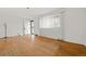 Sunlit living room showcasing hardwood floors and neutral walls at 8012 Zuni St, Denver, CO 80221