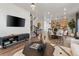 Bright living space with stylish furnishings and modern lighting at 2086 Wagon Wheel Aly, Brighton, CO 80601