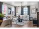 Open-concept living space featuring kitchen, dining, and living room at 2086 Wagon Wheel Aly, Brighton, CO 80601