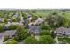A lovely home surrounded by lush trees with green lawns, backing to a farm in a quiet neighborhood at 2240 Summitview Dr, Longmont, CO 80504