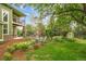 Expansive backyard with a patio and a lush lawn provides a perfect setting for outdoor enjoyment at 2240 Summitview Dr, Longmont, CO 80504