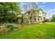 Charming two-story home with a well-manicured lawn and mature trees in a peaceful setting at 2240 Summitview Dr, Longmont, CO 80504