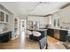 Open kitchen with granite island, modern appliances, lots of natural light, and ample counter space at 2240 Summitview Dr, Longmont, CO 80504