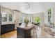 Open kitchen with granite island, modern appliances, lots of natural light, and ample counter space at 2240 Summitview Dr, Longmont, CO 80504