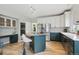Open kitchen with granite island, modern appliances, lots of natural light, and ample counter space at 2240 Summitview Dr, Longmont, CO 80504