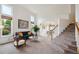 Bright living room boasts high ceilings, large windows, plush carpet, and stylish furnishings at 2240 Summitview Dr, Longmont, CO 80504