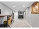A finished basement offers space for a small work out area and space for relaxing or entertaining at 6248 E Mineral Pl, Centennial, CO 80112