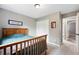 Comfortable bedroom with carpeted floors, closet, and natural light from the window at 6248 E Mineral Pl, Centennial, CO 80112
