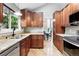 Well-equipped kitchen features granite countertops and stainless steel appliances at 6248 E Mineral Pl, Centennial, CO 80112