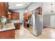 Spacious kitchen with stainless steel appliances, granite countertops, and ample cabinet space at 6248 E Mineral Pl, Centennial, CO 80112