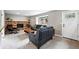 Cozy living room featuring a brick fireplace and comfortable seating at 6248 E Mineral Pl, Centennial, CO 80112