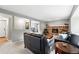 Comfortable living room with modern design and adjacent to a home office space at 6248 E Mineral Pl, Centennial, CO 80112