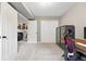 Bright office space with carpeted floors, storage cabinet, and convenient closet at 6248 E Mineral Pl, Centennial, CO 80112