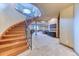 Finished basement with winding staircase and recreation area with bar, and pool table at 16713 W Archer Ave, Golden, CO 80401