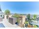 Relax on the spacious deck, complete with mountain views and stylish outdoor furniture, perfect for enjoying the outdoors at 16713 W Archer Ave, Golden, CO 80401