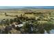 Beautiful aerial view of a property nestled among lush trees, offering privacy and serene views at 428 N Perry Park Rd, Sedalia, CO 80135