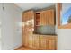 A view of the kitchen with custom wood cabinets and stylish countertops at 428 N Perry Park Rd, Sedalia, CO 80135