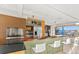 A view of the kitchen with eat in counter and stainless steel appliances at 428 N Perry Park Rd, Sedalia, CO 80135