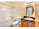 Clean bathroom with tub, toilet and vanity at 17102 E Baltic Dr # F, Aurora, CO 80013