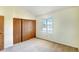 Spacious bedroom with window and closet at 17102 E Baltic Dr # F, Aurora, CO 80013