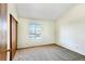 Bright bedroom with window and closet at 17102 E Baltic Dr # F, Aurora, CO 80013