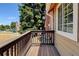 Small deck or balcony with wooden railings at 17102 E Baltic Dr # F, Aurora, CO 80013