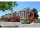 Townhome complex with multiple units and parking at 17102 E Baltic Dr # F, Aurora, CO 80013