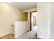 Upstairs hallway with access to bedrooms at 17102 E Baltic Dr # F, Aurora, CO 80013