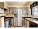 View of kitchen with stainless steel appliances at 17102 E Baltic Dr # F, Aurora, CO 80013