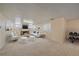 Finished basement with a living area featuring a fireplace and an open workout space at 2065 Leyden St, Denver, CO 80207