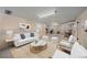 Finished basement featuring a comfortable living area and a well-equipped home gym space at 2065 Leyden St, Denver, CO 80207