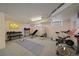 Home gym featuring weightlifting equipment and cardio machines for a complete workout at 2065 Leyden St, Denver, CO 80207