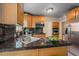 Well-equipped kitchen with stainless steel appliances and granite countertops at 2065 Leyden St, Denver, CO 80207