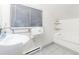 Bright bathroom with a large mirror and glass shelves for storage at 6365 Highway 9, Breckenridge, CO 80424