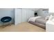Comfortable bedroom with plush carpeting, a sitting chair and ample closet space at 6365 Highway 9, Breckenridge, CO 80424