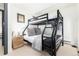 Cozy bedroom featuring a bunk bed with a stylish black metal frame and comfortable bedding at 6365 Highway 9, Breckenridge, CO 80424