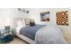Serene bedroom with large window, modern decor, and a comfortable bed at 6365 Highway 9, Breckenridge, CO 80424