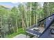Spacious deck with mountain and treeline views, perfect for outdoor entertaining and relaxing at 6365 Highway 9, Breckenridge, CO 80424